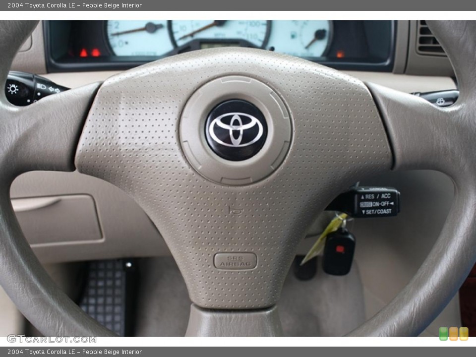 Pebble Beige Interior Steering Wheel for the 2004 Toyota Corolla LE #45797083