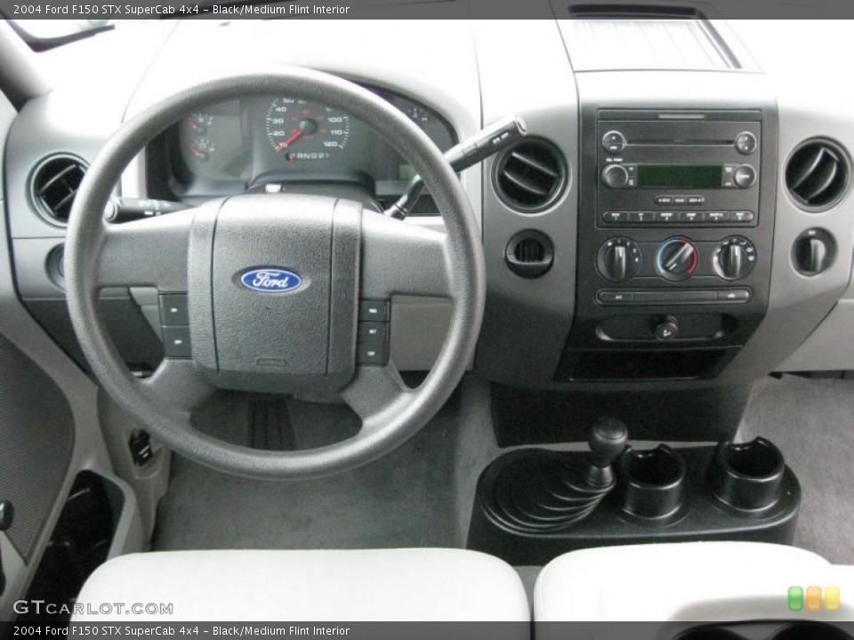 Black/Medium Flint Interior Dashboard for the 2004 Ford F150 STX SuperCab 4x4 #45814549