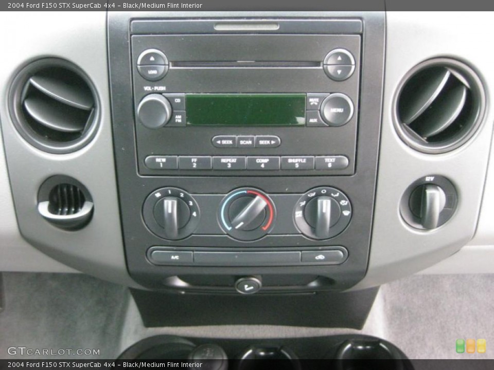 Black/Medium Flint Interior Controls for the 2004 Ford F150 STX SuperCab 4x4 #45814553