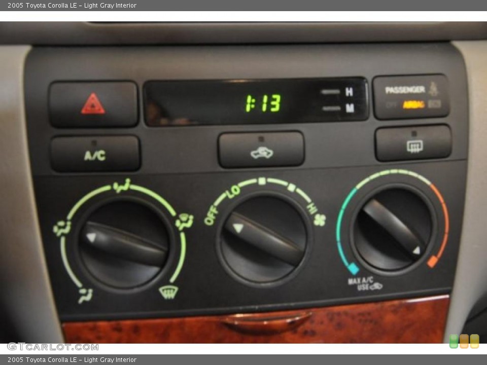 Light Gray Interior Controls for the 2005 Toyota Corolla LE #45824437
