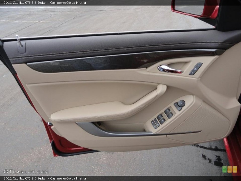 Cashmere/Cocoa Interior Door Panel for the 2011 Cadillac CTS 3.6 Sedan #45849128