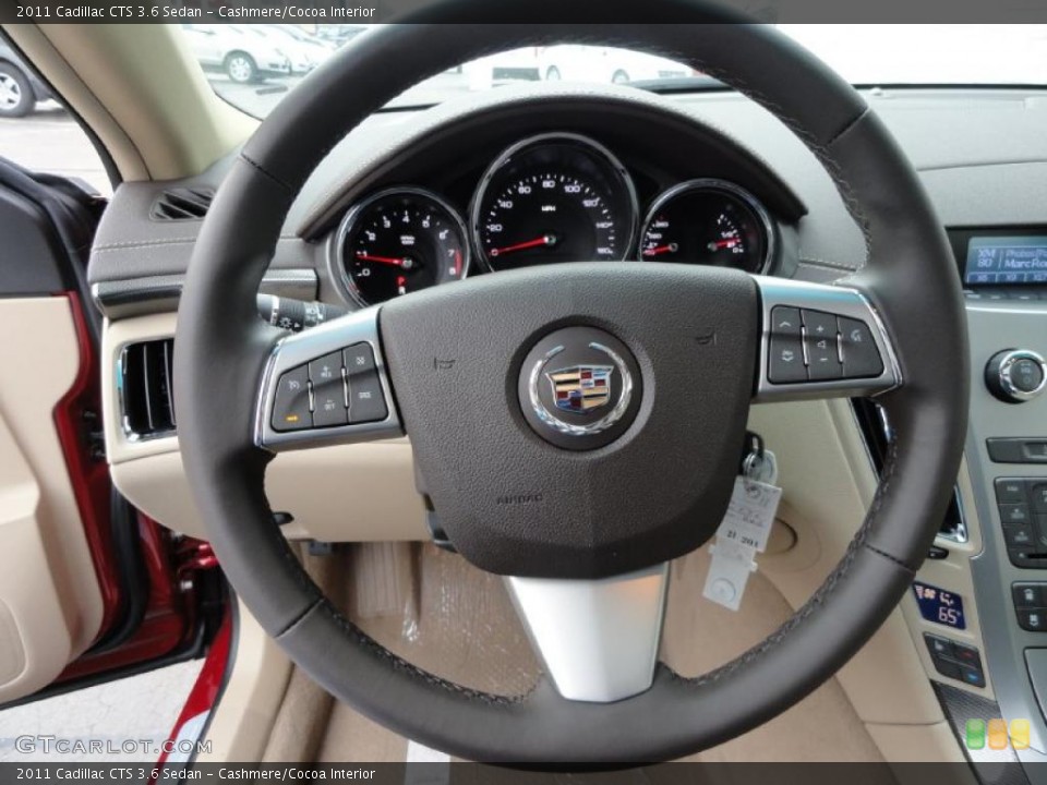 Cashmere/Cocoa Interior Steering Wheel for the 2011 Cadillac CTS 3.6 Sedan #45849136