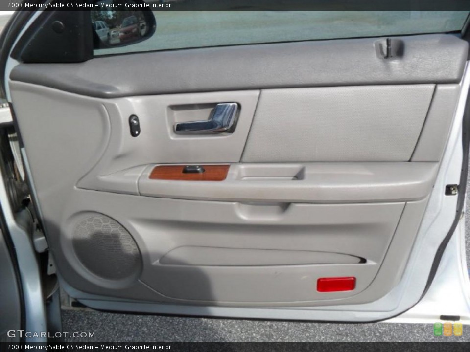 Medium Graphite Interior Door Panel for the 2003 Mercury Sable GS Sedan #45853189