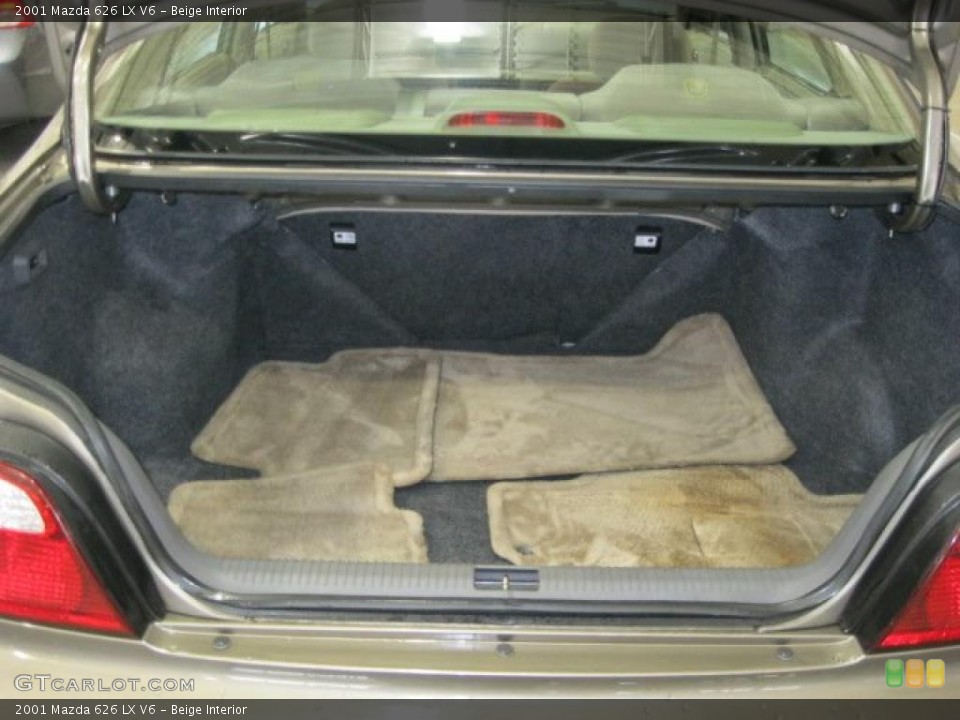 Beige Interior Trunk for the 2001 Mazda 626 LX V6 #45864643