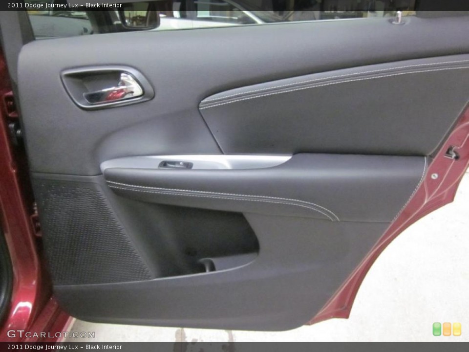 Black Interior Door Panel for the 2011 Dodge Journey Lux #45868419