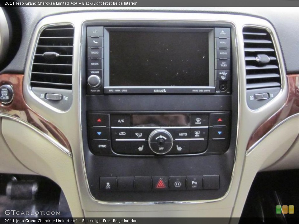 Black/Light Frost Beige Interior Controls for the 2011 Jeep Grand Cherokee Limited 4x4 #45869075