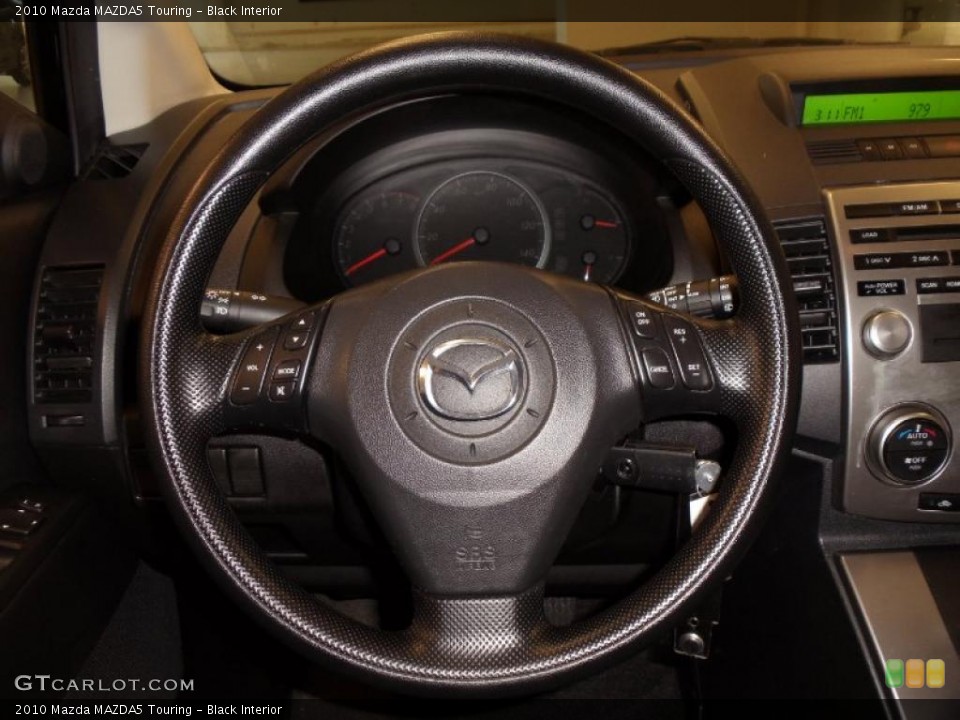 Black Interior Steering Wheel for the 2010 Mazda MAZDA5 Touring #45909150