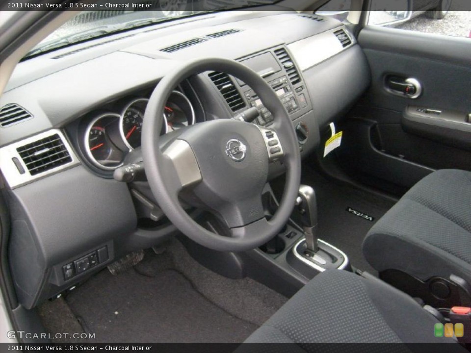 Charcoal Interior Prime Interior for the 2011 Nissan Versa 1.8 S Sedan #45929014