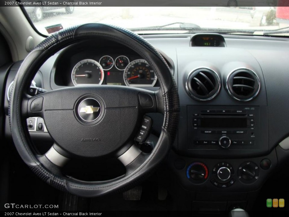 Charcoal Black Interior Dashboard for the 2007 Chevrolet Aveo LT Sedan #45932412