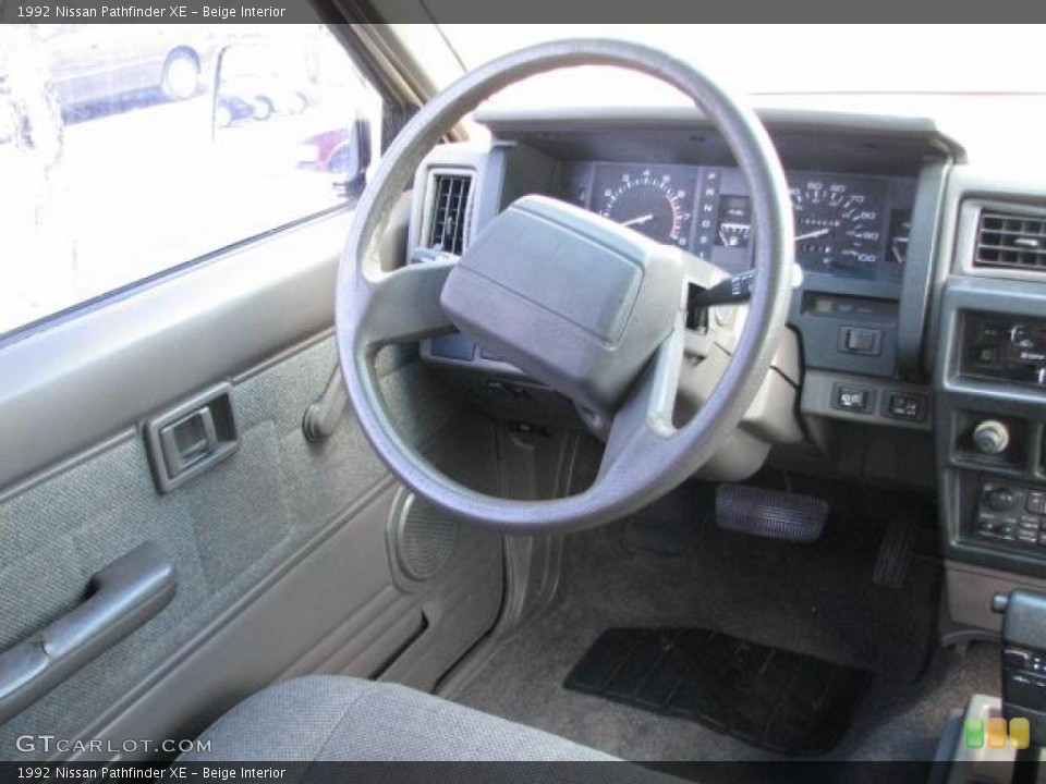 Beige Interior Steering Wheel for the 1992 Nissan Pathfinder XE #45941070