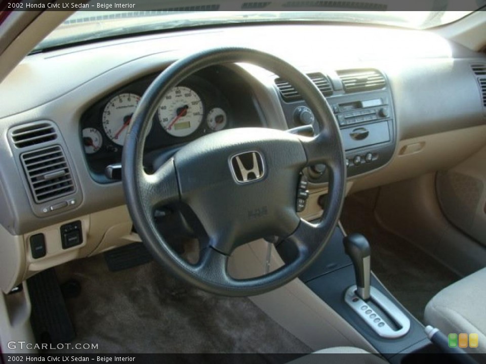 Beige Interior Dashboard for the 2002 Honda Civic LX Sedan #45941991