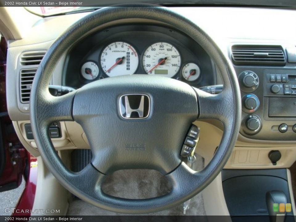 Beige Interior Steering Wheel for the 2002 Honda Civic LX Sedan #45942039