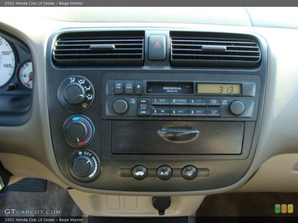 Beige Interior Controls for the 2002 Honda Civic LX Sedan #45942063