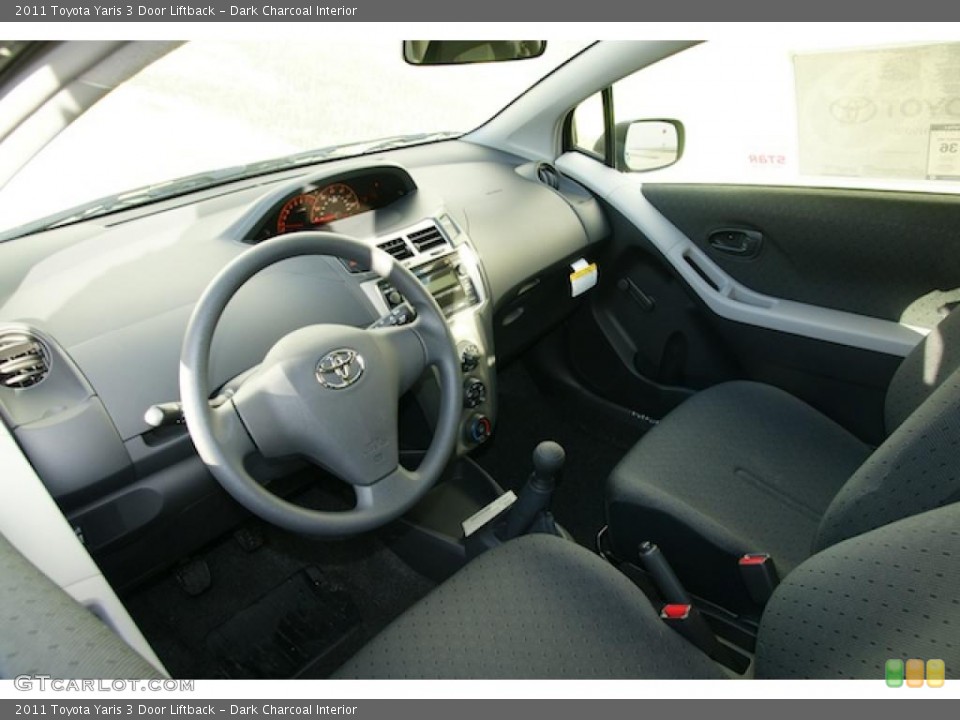 Dark Charcoal Interior Prime Interior for the 2011 Toyota Yaris 3 Door Liftback #45945414