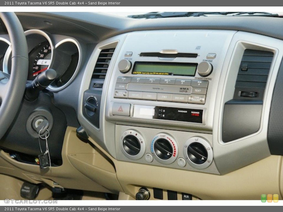 Sand Beige Interior Controls for the 2011 Toyota Tacoma V6 SR5 Double Cab 4x4 #45946353