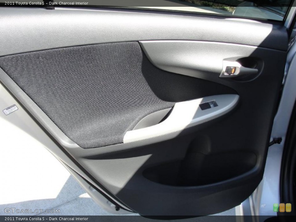 Dark Charcoal Interior Door Panel for the 2011 Toyota Corolla S #45964394
