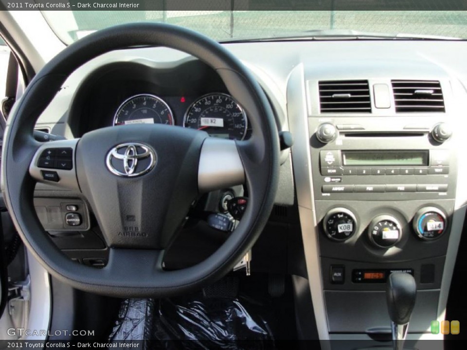 Dark Charcoal Interior Dashboard for the 2011 Toyota Corolla S #45964451