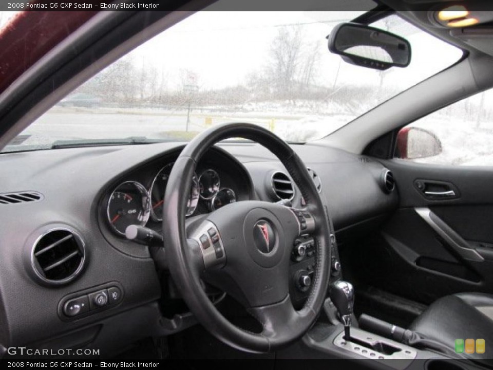 Ebony Black Interior Dashboard for the 2008 Pontiac G6 GXP Sedan #45993668