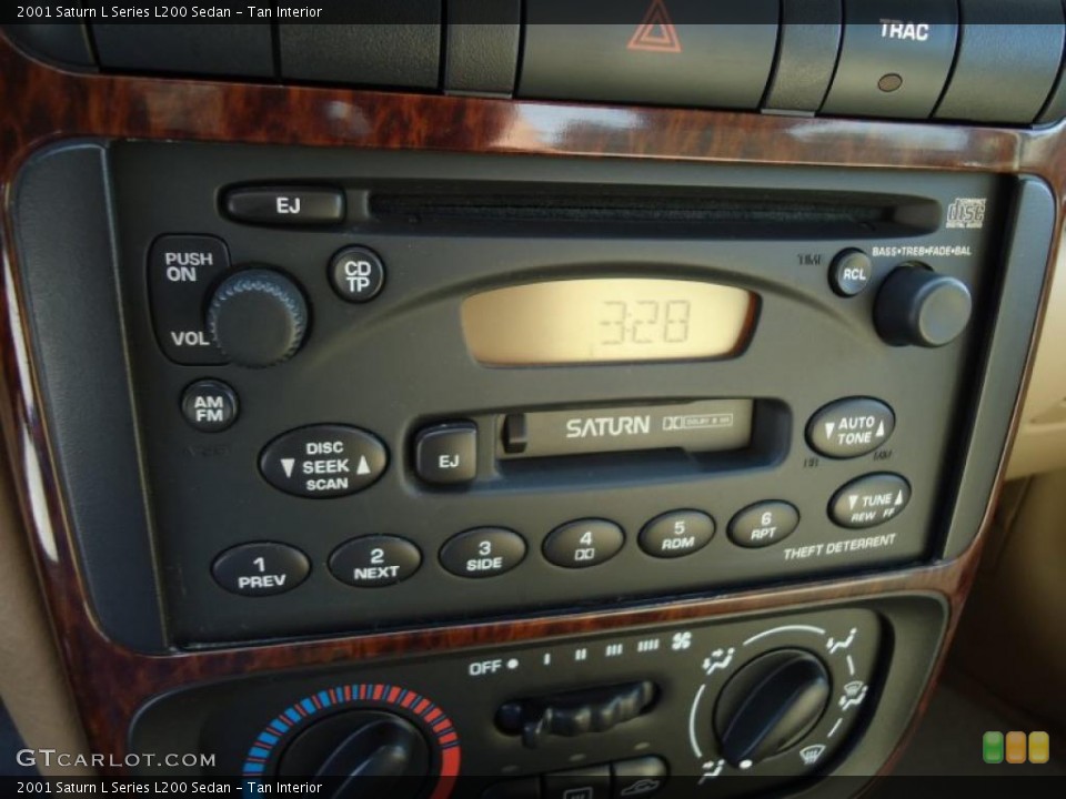 Tan Interior Controls for the 2001 Saturn L Series L200 Sedan #46025296