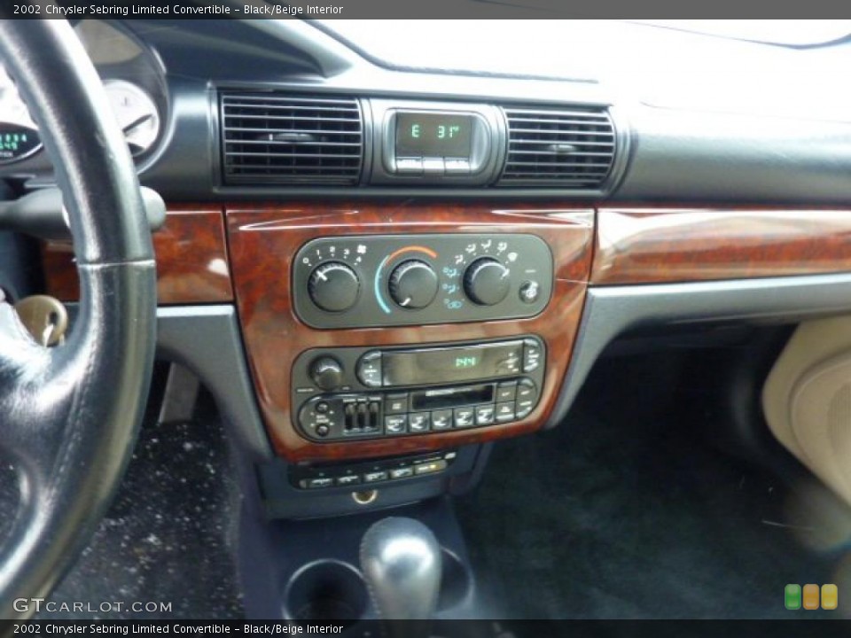 Black/Beige Interior Controls for the 2002 Chrysler Sebring Limited Convertible #46027435