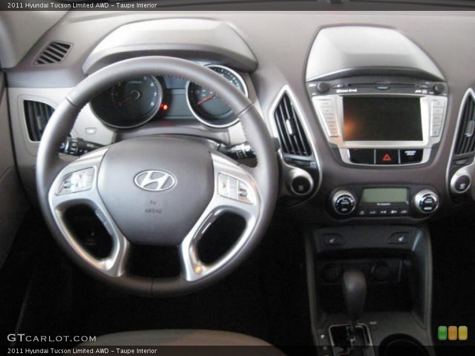 Taupe Interior Dashboard for the 2011 Hyundai Tucson Limited AWD #46034496