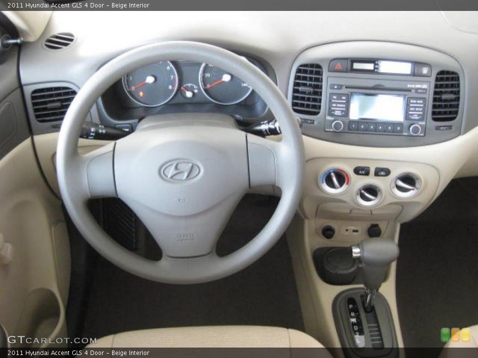 Beige Interior Dashboard for the 2011 Hyundai Accent GLS 4 Door #46034685