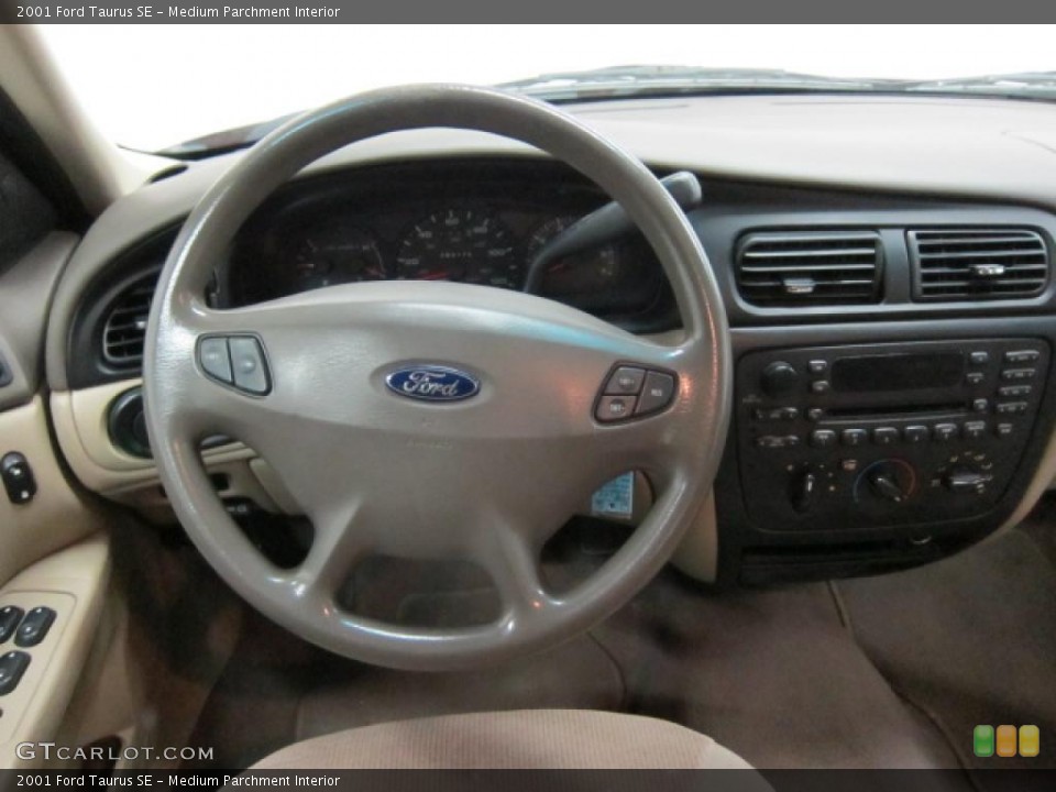 Medium Parchment Interior Dashboard for the 2001 Ford Taurus SE #46039327
