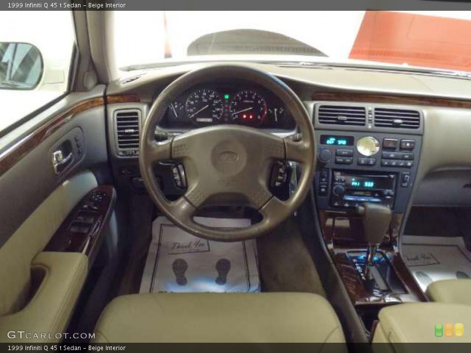 Beige Interior Dashboard for the 1999 Infiniti Q 45 t Sedan #46039516