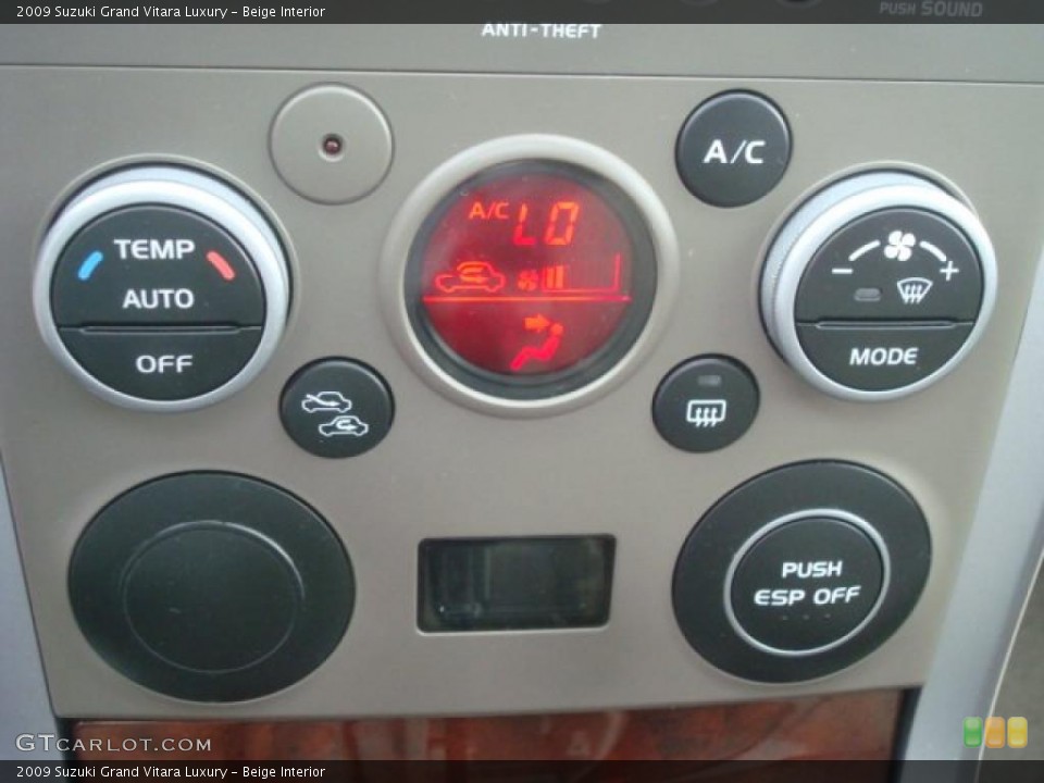 Beige Interior Controls for the 2009 Suzuki Grand Vitara Luxury #46043153