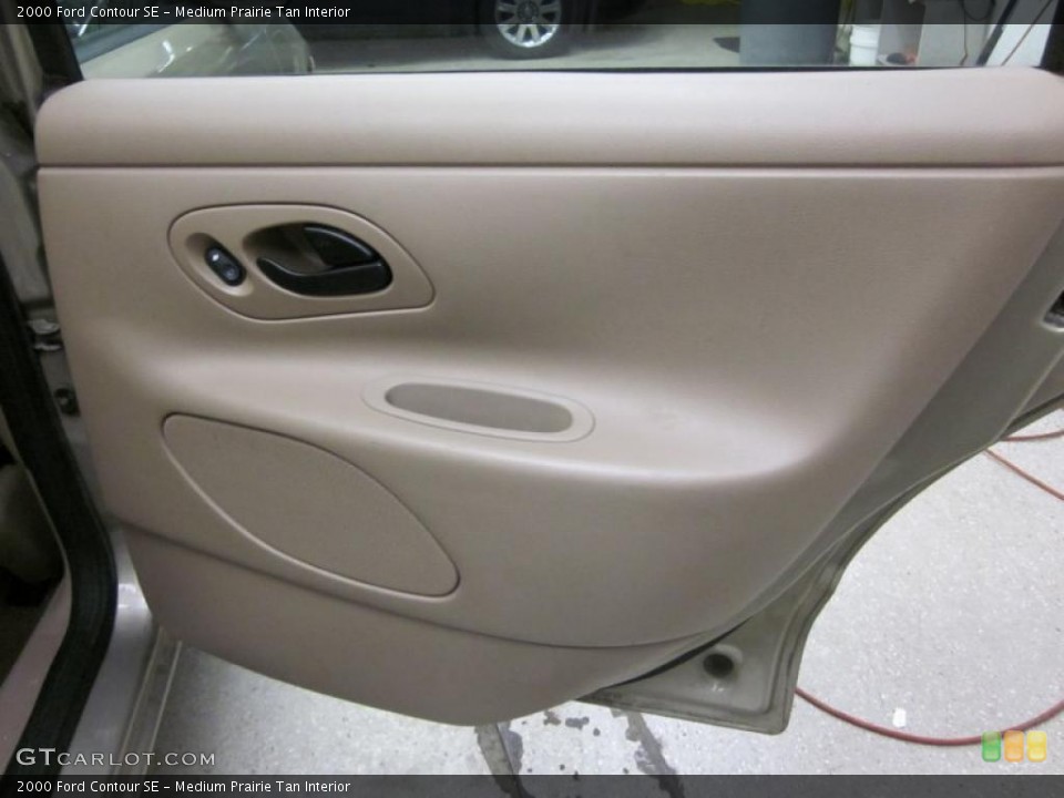 Medium Prairie Tan Interior Door Panel for the 2000 Ford Contour SE #46047596