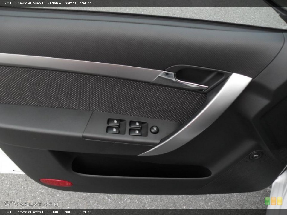 Charcoal Interior Door Panel for the 2011 Chevrolet Aveo LT Sedan #46062324