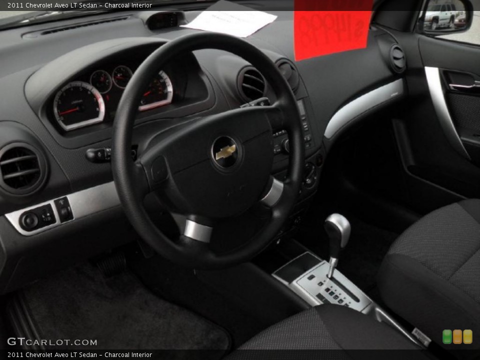 Charcoal Interior Prime Interior for the 2011 Chevrolet Aveo LT Sedan #46062639