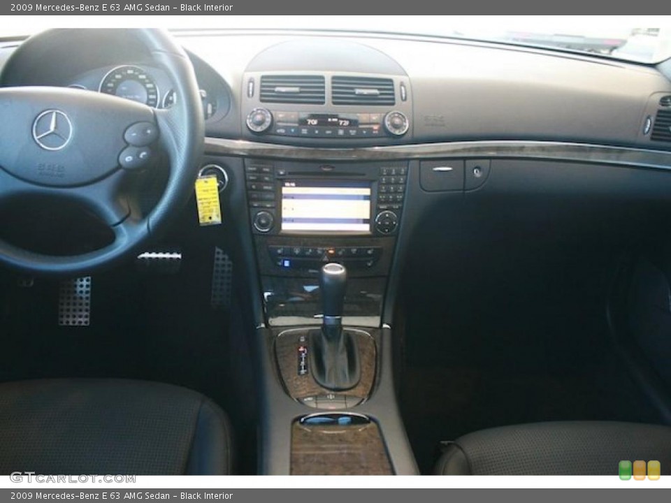 Black Interior Dashboard for the 2009 Mercedes-Benz E 63 AMG Sedan #46064208