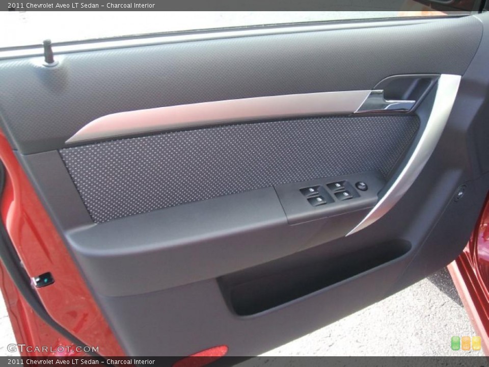 Charcoal Interior Door Panel for the 2011 Chevrolet Aveo LT Sedan #46103678