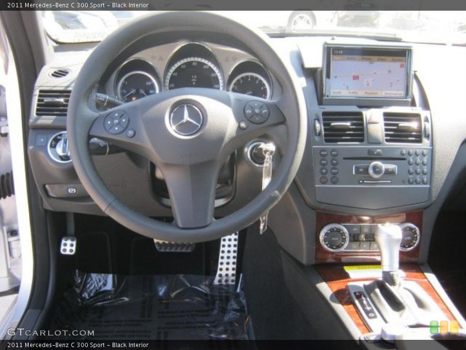 Black Interior Dashboard for the 2011 Mercedes-Benz C 300 Sport #46113674