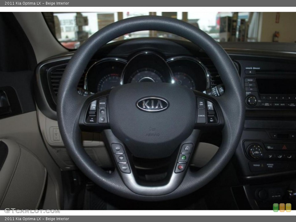 Beige Interior Steering Wheel for the 2011 Kia Optima LX #46114559