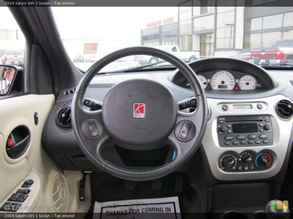 Tan Interior Dashboard for the 2004 Saturn ION 3 Sedan #46117601