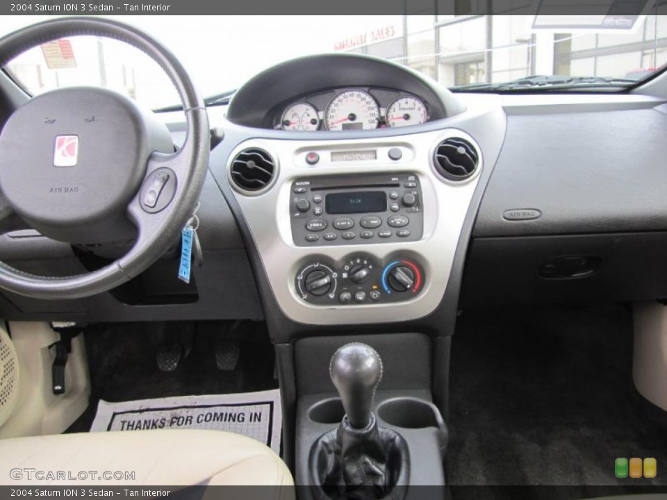 Tan Interior Dashboard for the 2004 Saturn ION 3 Sedan #46117610