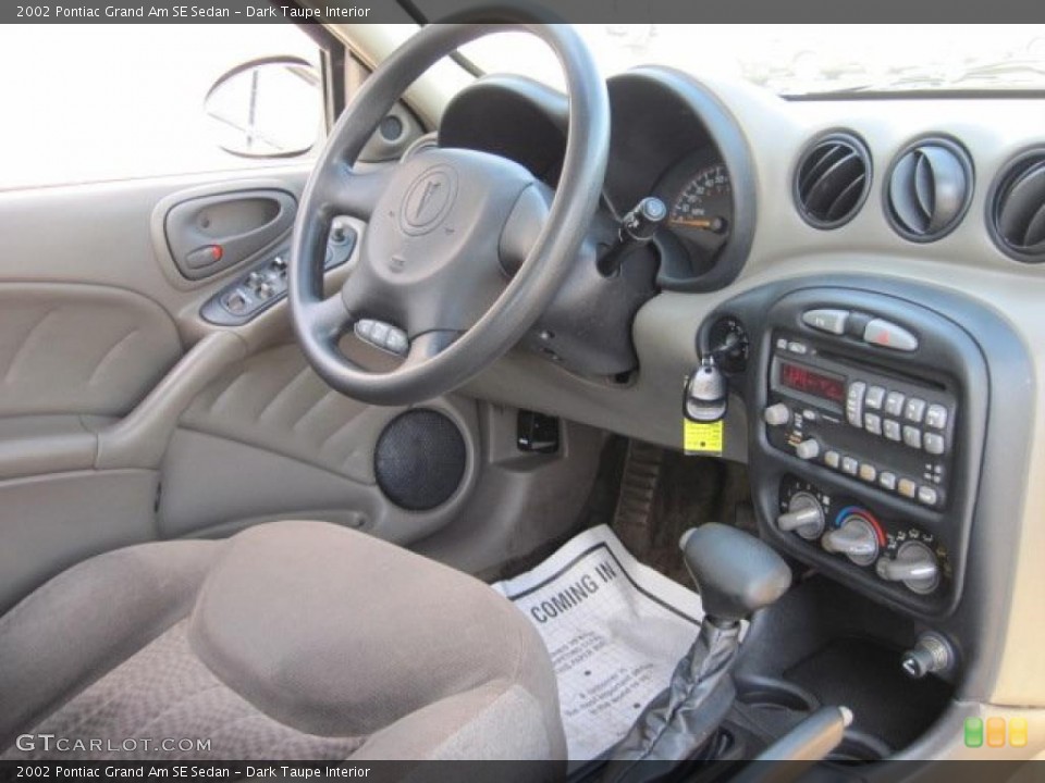 Dark Taupe Interior Photo for the 2002 Pontiac Grand Am SE Sedan #46119089