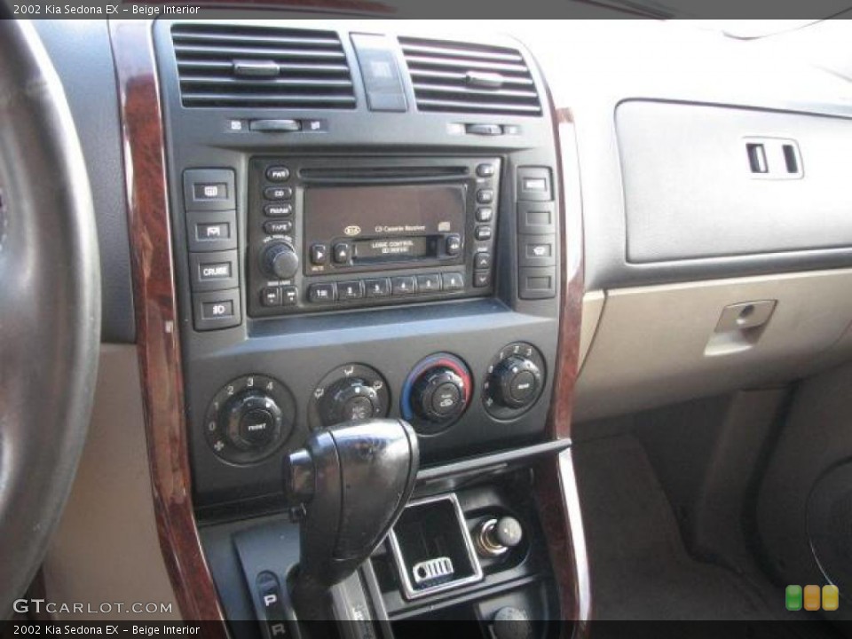Beige Interior Controls for the 2002 Kia Sedona EX #46130209