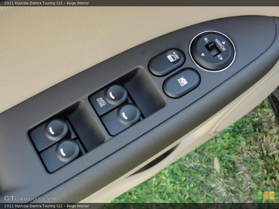 Beige Interior Controls for the 2011 Hyundai Elantra Touring GLS #46141387