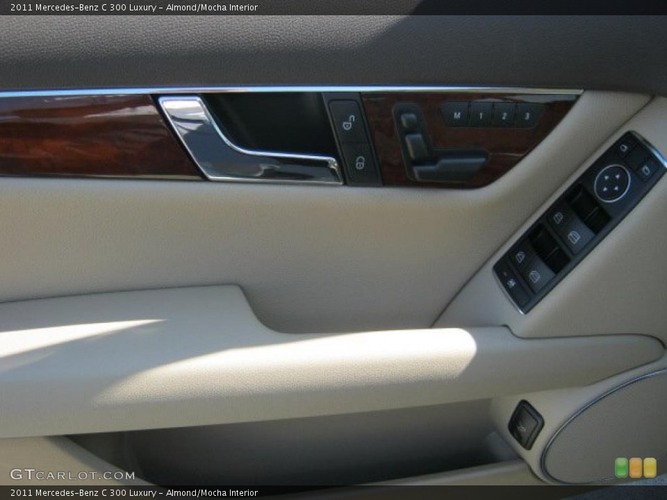 Almond/Mocha Interior Door Panel for the 2011 Mercedes-Benz C 300 Luxury #46169321