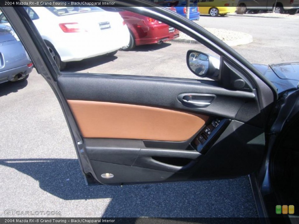 Black/Chapparal Interior Door Panel for the 2004 Mazda RX-8 Grand Touring #46171667