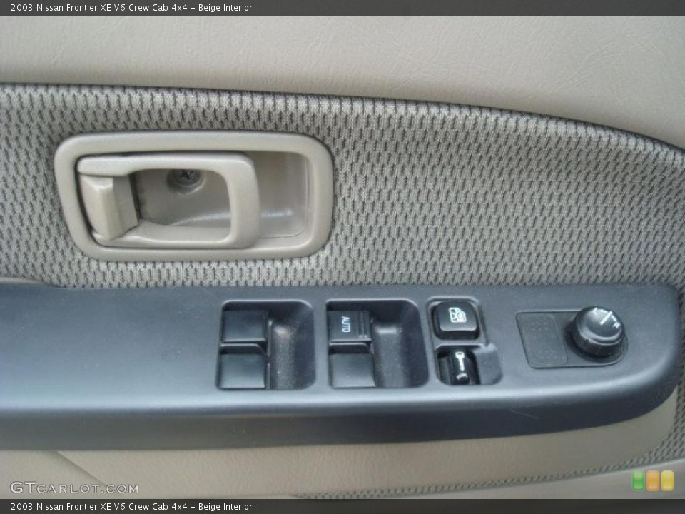 Beige Interior Controls for the 2003 Nissan Frontier XE V6 Crew Cab 4x4 #46176549
