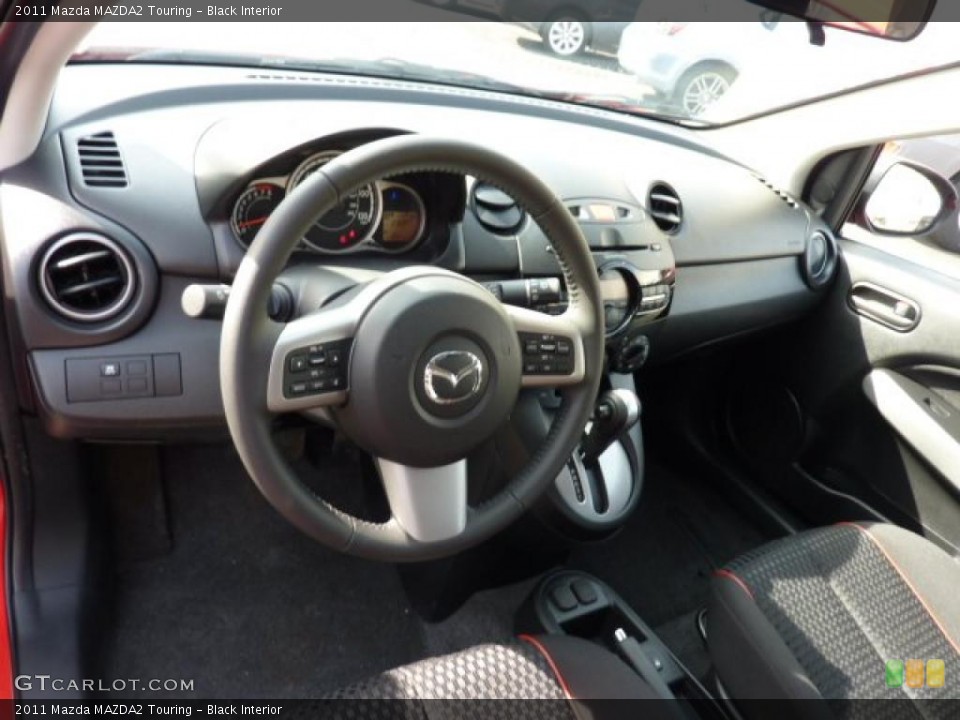 Black Interior Photo for the 2011 Mazda MAZDA2 Touring #46194302