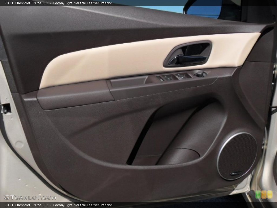 Cocoa/Light Neutral Leather Interior Door Panel for the 2011 Chevrolet Cruze LTZ #46196078