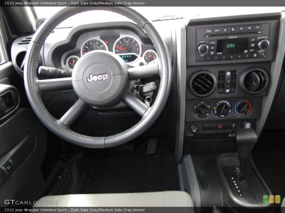Dark Slate Gray/Medium Slate Gray Interior Controls for the 2010 Jeep Wrangler Unlimited Sport #46209797