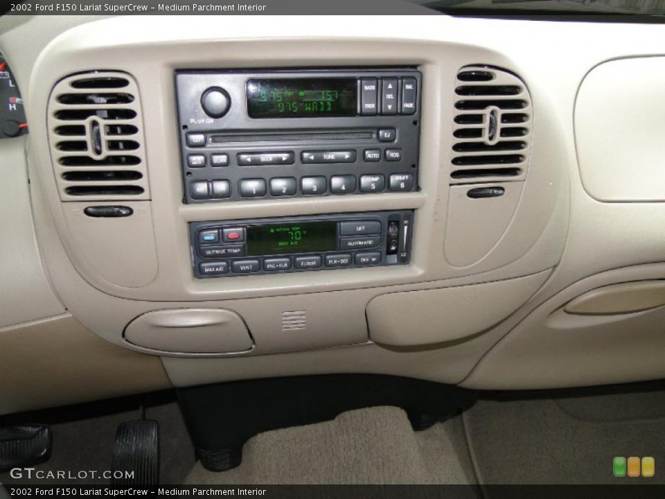 Medium Parchment Interior Controls for the 2002 Ford F150 Lariat SuperCrew #46210841