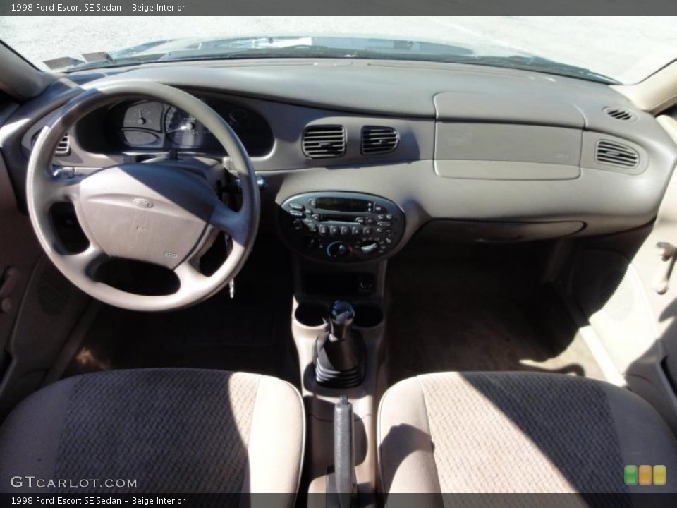 Beige Interior Dashboard for the 1998 Ford Escort SE Sedan #46217855