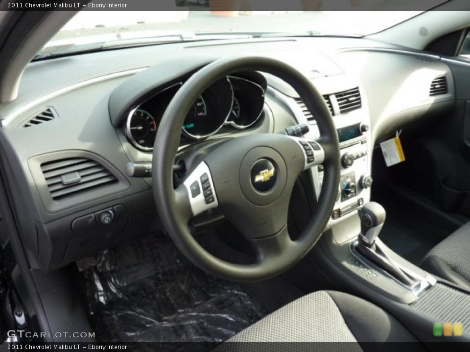 Ebony Interior Dashboard for the 2011 Chevrolet Malibu LT #46224716